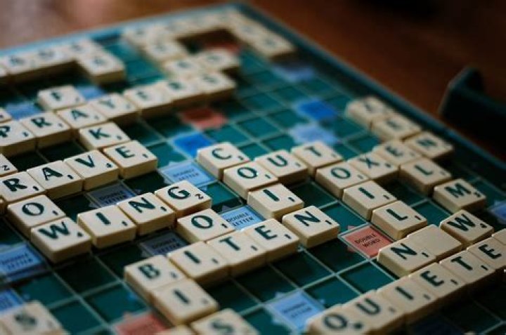 Mahjong or Scrabble piece crossword clue answer